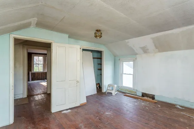 wooden floor and windows in an empty room