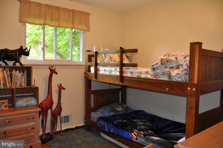 8612 Victoria Road Springfield, VA 22151 - Photo 3 of 25 a room with lots of stuff and furniture