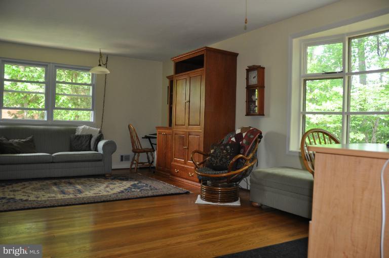 8612 Victoria Road Springfield, VA 22151 - Photo 22 of 25 a living room with furniture and a large window