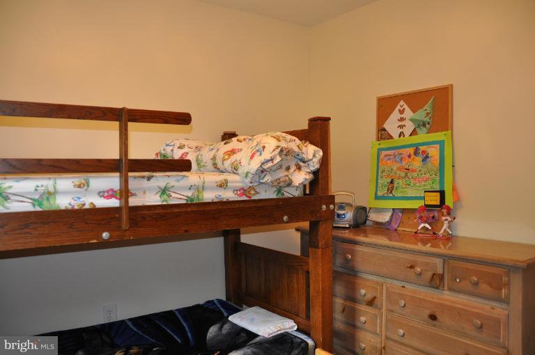 8612 Victoria Road Springfield, VA 22151 - Photo 7 of 25 a view of a room with furniture and window