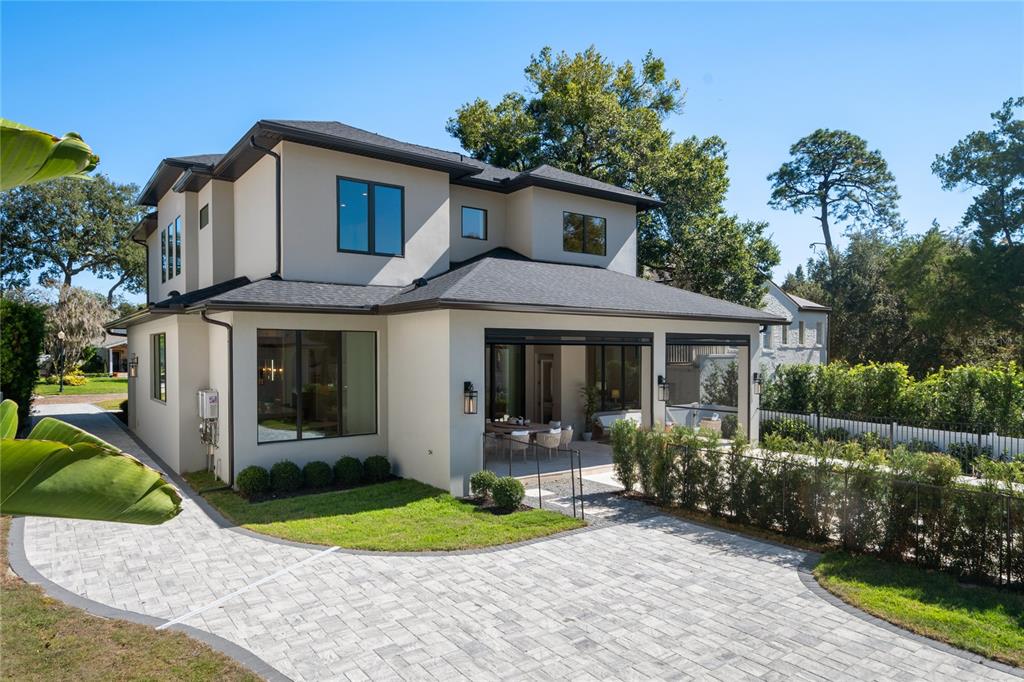 1751 Glencoe Road Winter Park, FL 32789 - Photo 39 of 45 a front view of a house with garden