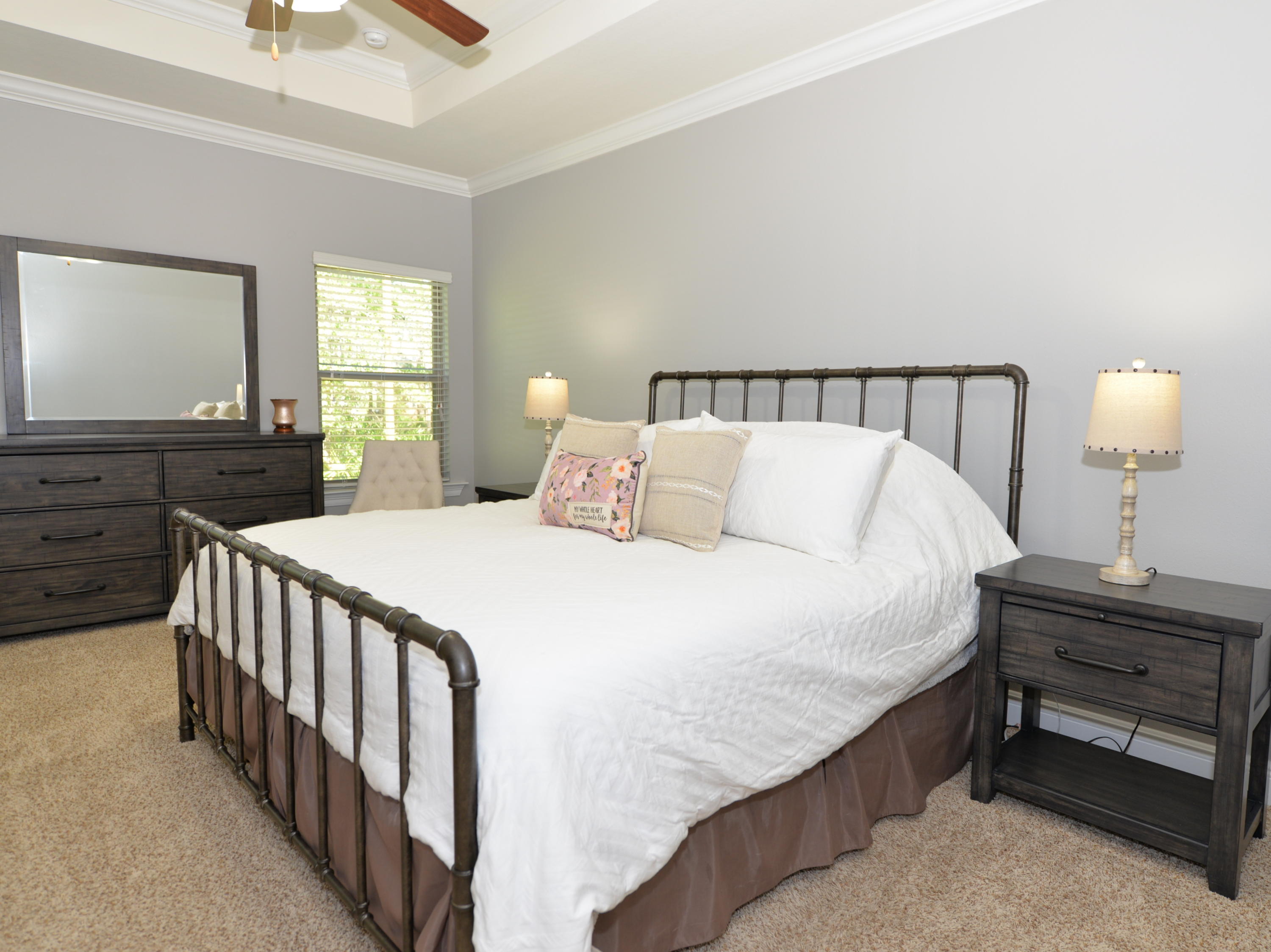 491 Old Ferry Road Santa Rosa Beach, FL 32459 - Photo 14 of 31 a bedroom with a bed and a lamp on dresser