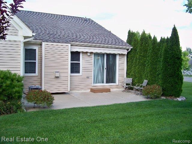438 Lilly View Court, Unit 86 Howell, MI 48843 - Photo 24 of 25 Rear Patio