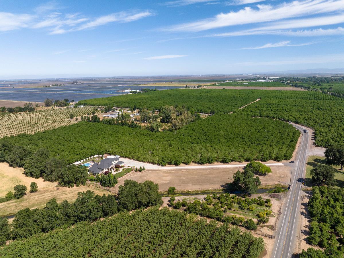 2165 West Biggs Gridley Road Gridley, CA 95948 - Photo 14 of 98 a view of a lake with a building in the background