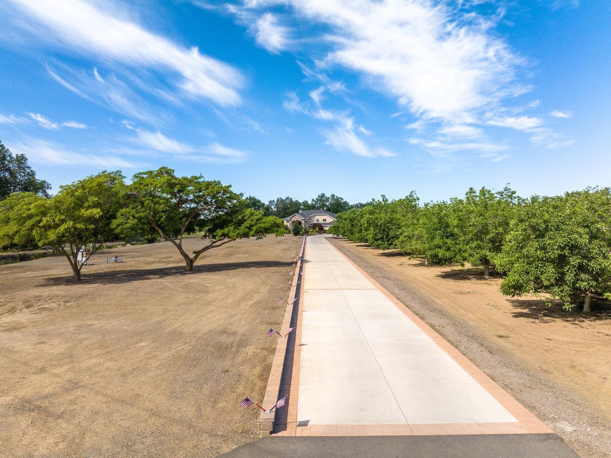 2165 West Biggs Gridley Road Gridley, CA 95948 - Photo 15 of 98 a view of a swimming pool with an outdoor space
