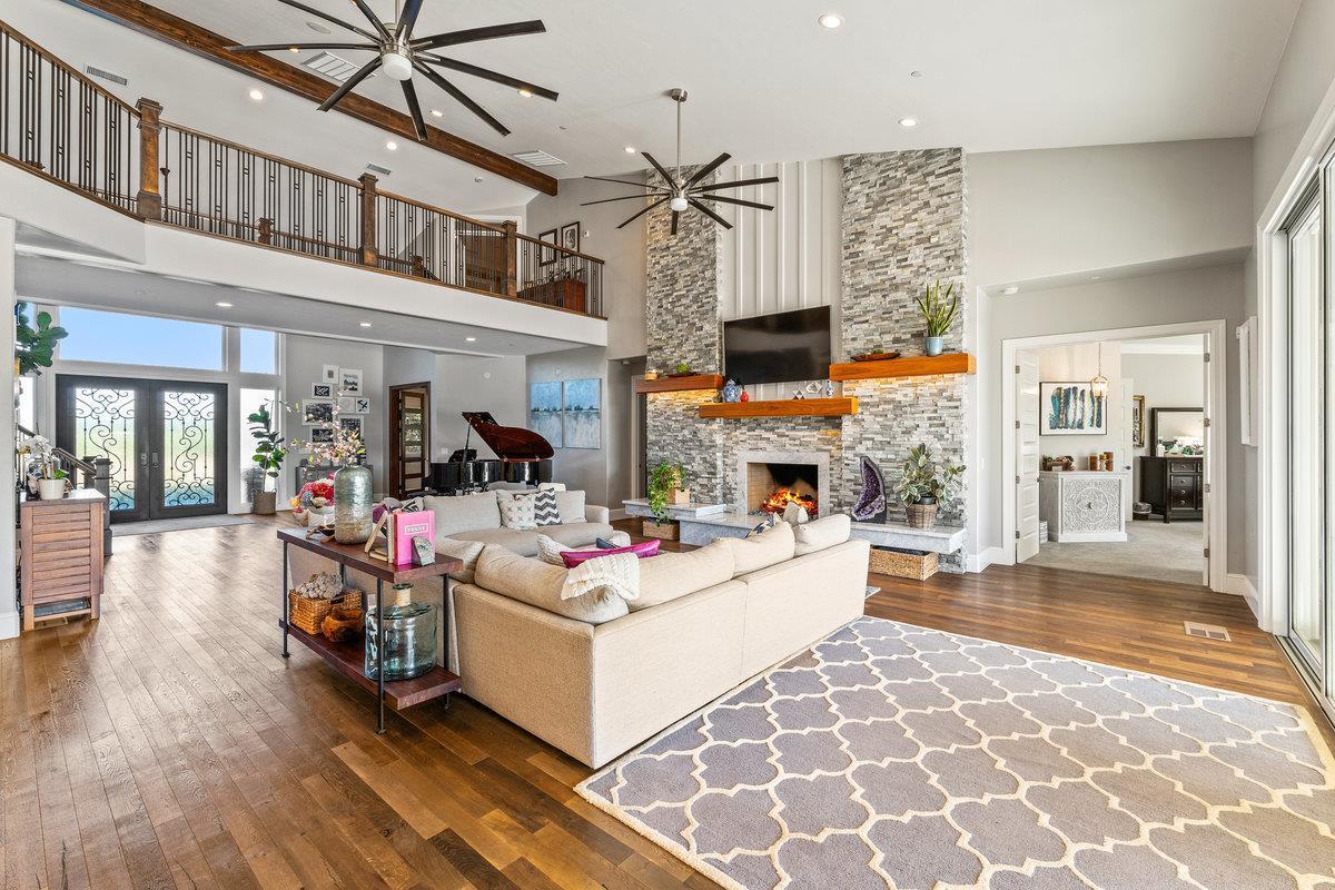 2165 West Biggs Gridley Road Gridley, CA 95948 - Photo 21 of 98 a living room with fireplace furniture and a wooden floor