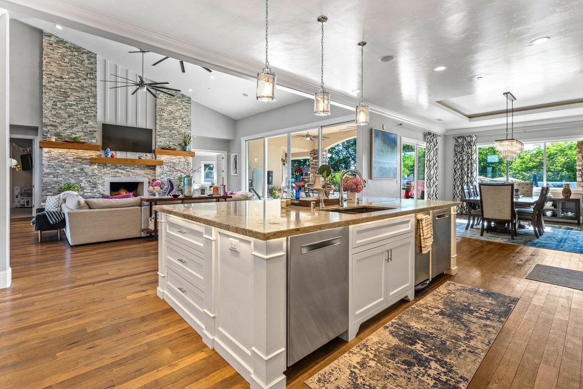 2165 West Biggs Gridley Road Gridley, CA 95948 - Photo 27 of 98 a kitchen with stainless steel appliances granite countertop a sink and a stove
