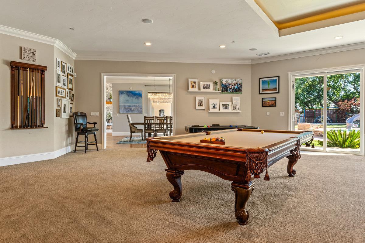 2165 West Biggs Gridley Road Gridley, CA 95948 - Photo 38 of 98 a room with pool table and windows