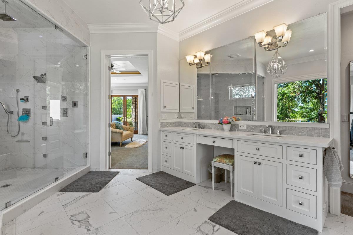 2165 West Biggs Gridley Road Gridley, CA 95948 - Photo 42 of 98 a spacious bathroom with a granite countertop sink a toilet a shower and a mirror