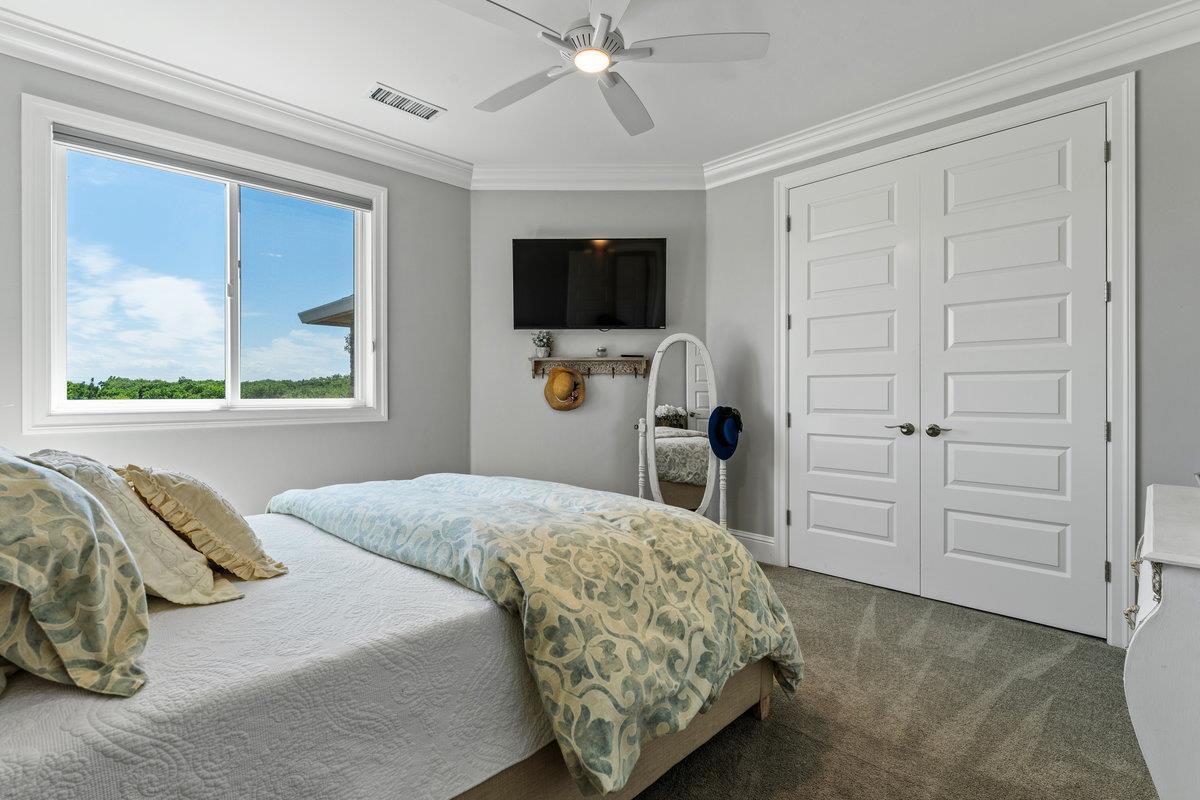 2165 West Biggs Gridley Road Gridley, CA 95948 - Photo 57 of 98 a bedroom with a bed and a flat screen tv