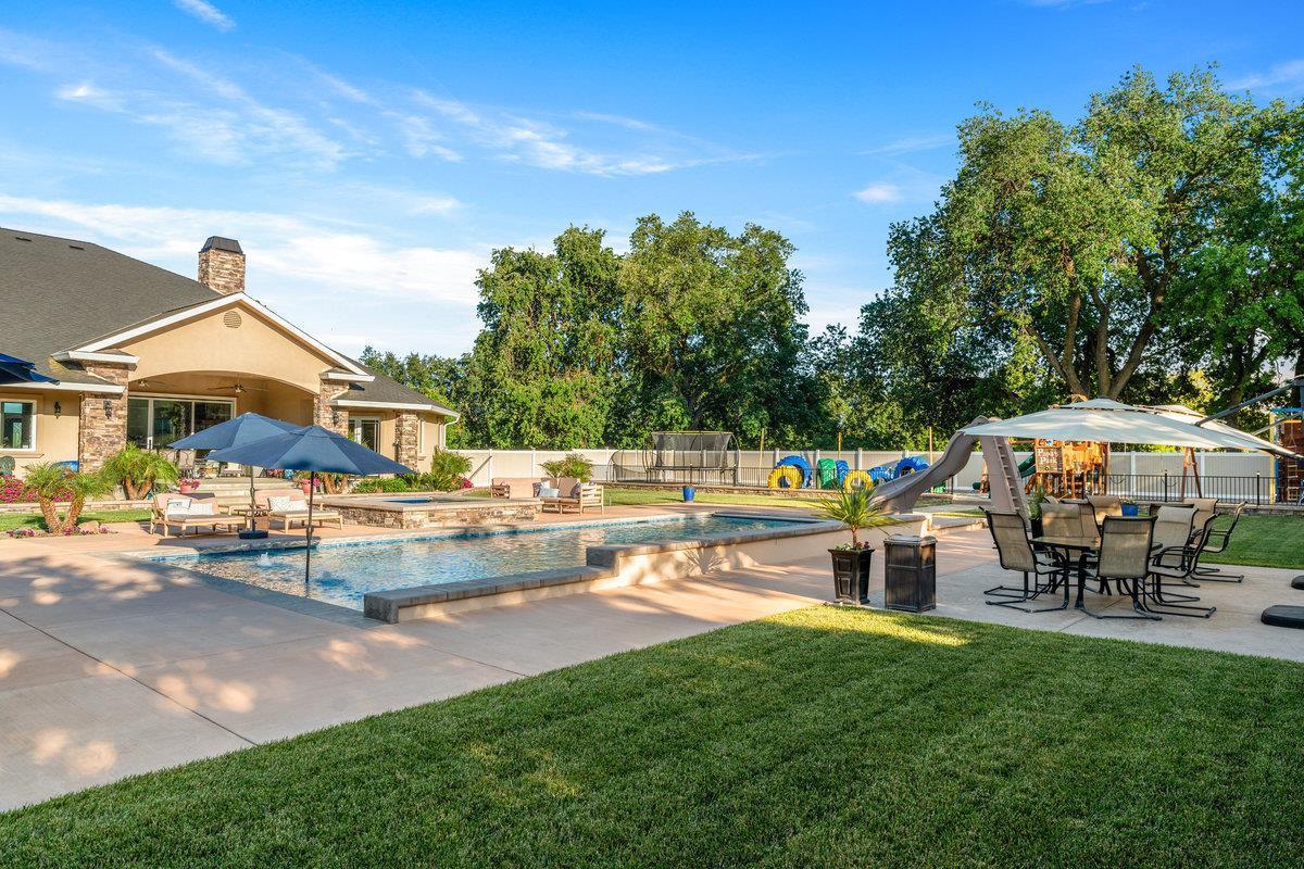2165 West Biggs Gridley Road Gridley, CA 95948 - Photo 80 of 98 a view of a house with a yard patio and sitting area