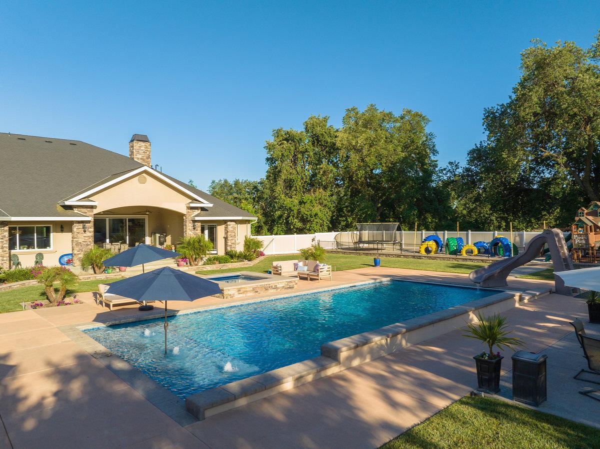 2165 West Biggs Gridley Road Gridley, CA 95948 - Photo 87 of 98 a view of a house with swimming pool and sitting area