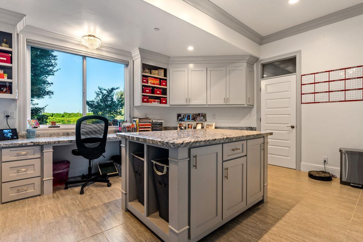 2165 West Biggs Gridley Road Gridley, CA 95948 - Photo 92 of 98 a kitchen with kitchen island granite countertop a stove a sink and a refrigerator