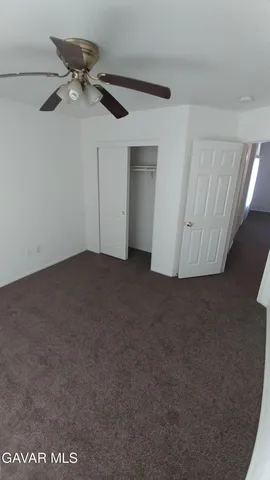 a bathroom with a double vanity sink and mirror