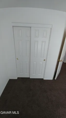 a bathroom with a sink and cabinets