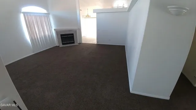 a view of a living room with furniture