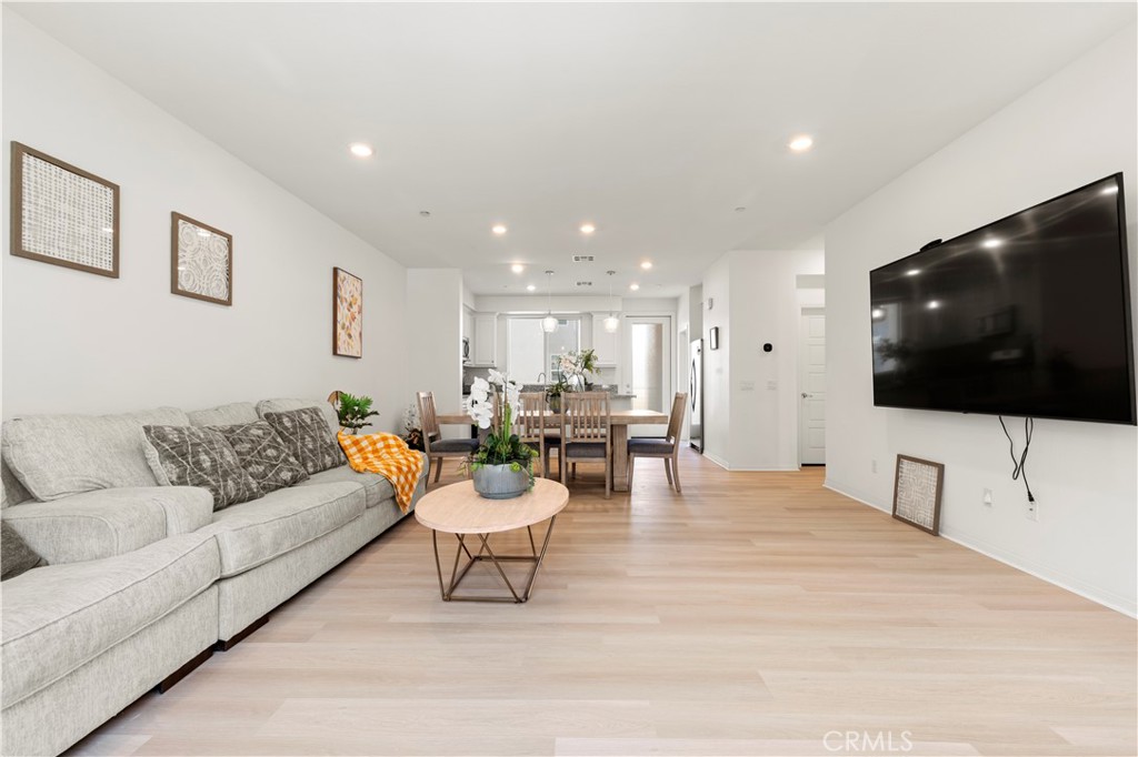 185 Steely Irvine, CA 92614 - Photo 16 of 28 a living room with furniture and a flat screen tv