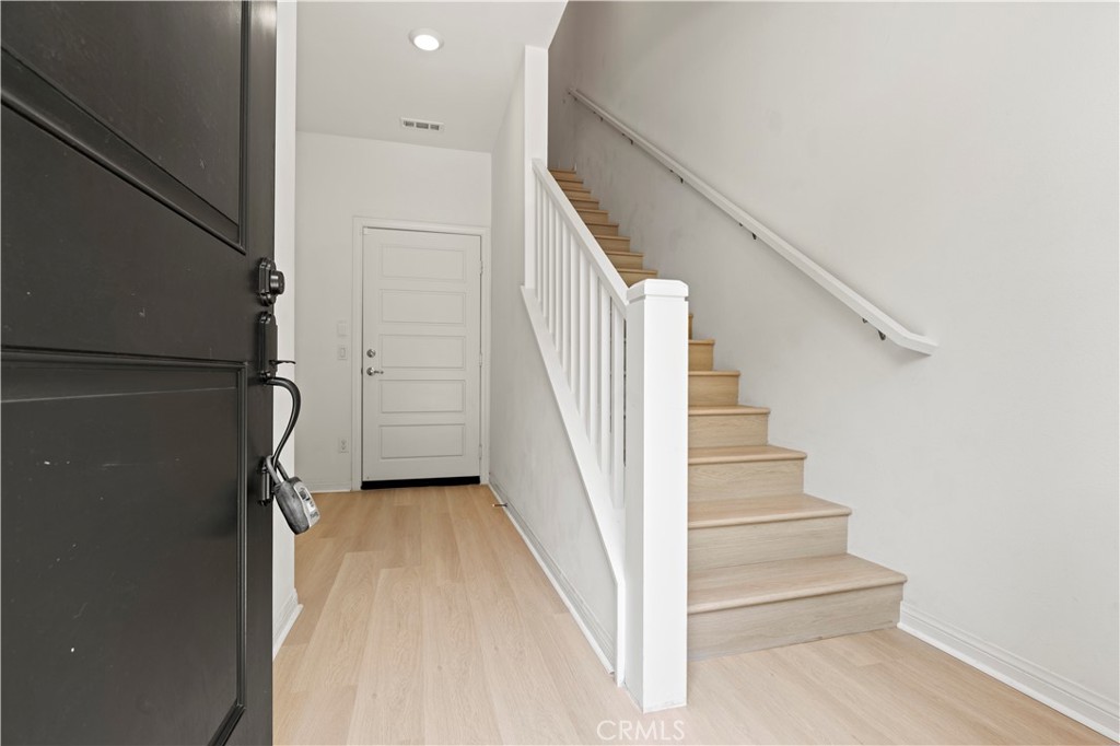 185 Steely Irvine, CA 92614 - Photo 2 of 28 a view of entryway and hall with wooden floor