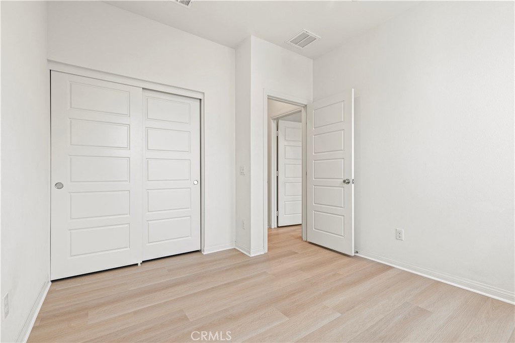 185 Steely Irvine, CA 92614 - Photo 21 of 28 an empty room with wooden floor