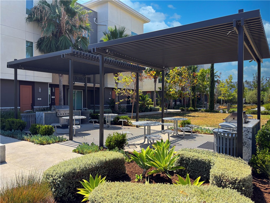 185 Steely Irvine, CA 92614 - Photo 25 of 28 a view of a backyard with swimming pool and sitting area