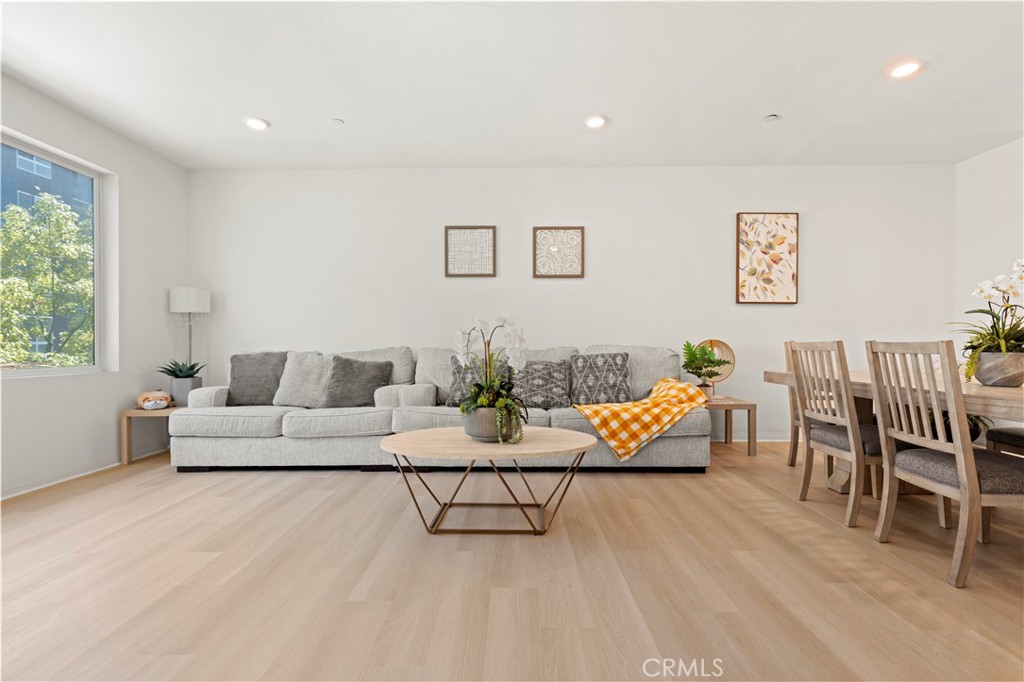 185 Steely Irvine, CA 92614 - Photo 8 of 28 a living room with furniture and a table