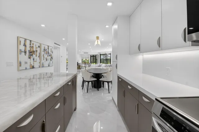 a white bath tub sitting next to a shower