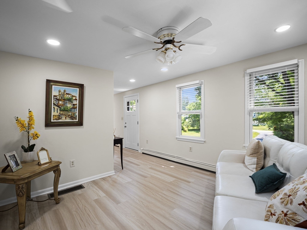 13 Plain Street Upton, MA 01568 - Photo 16 of 42 a living room with furniture and a window