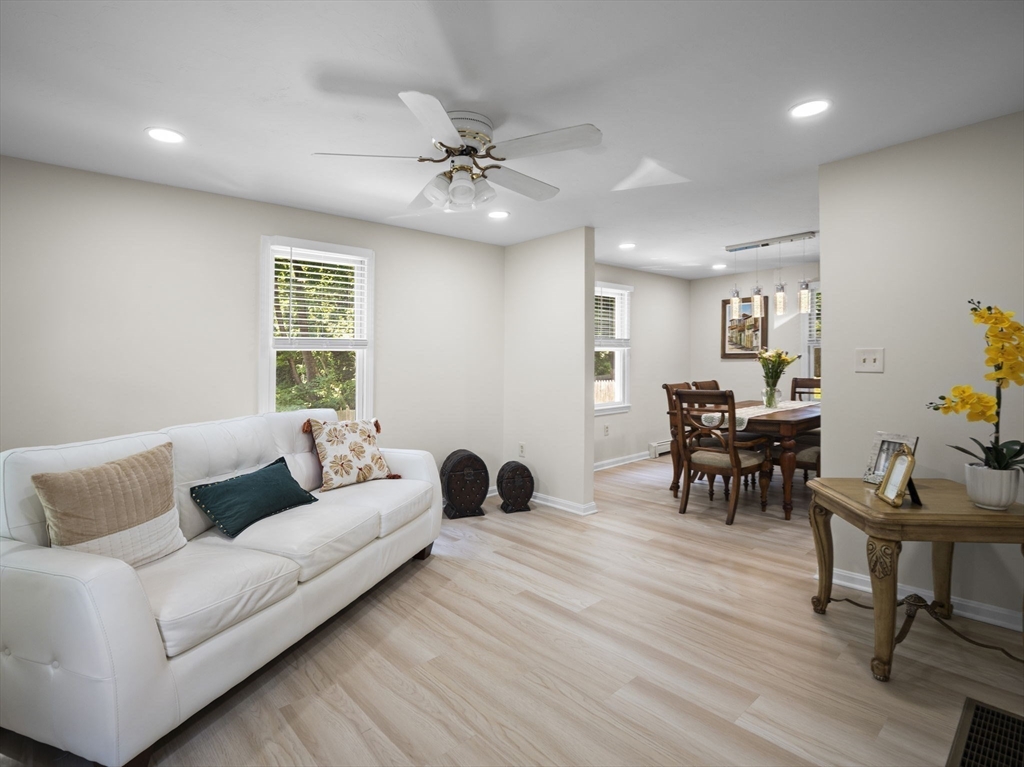13 Plain Street Upton, MA 01568 - Photo 17 of 42 a living room with furniture and wooden floor