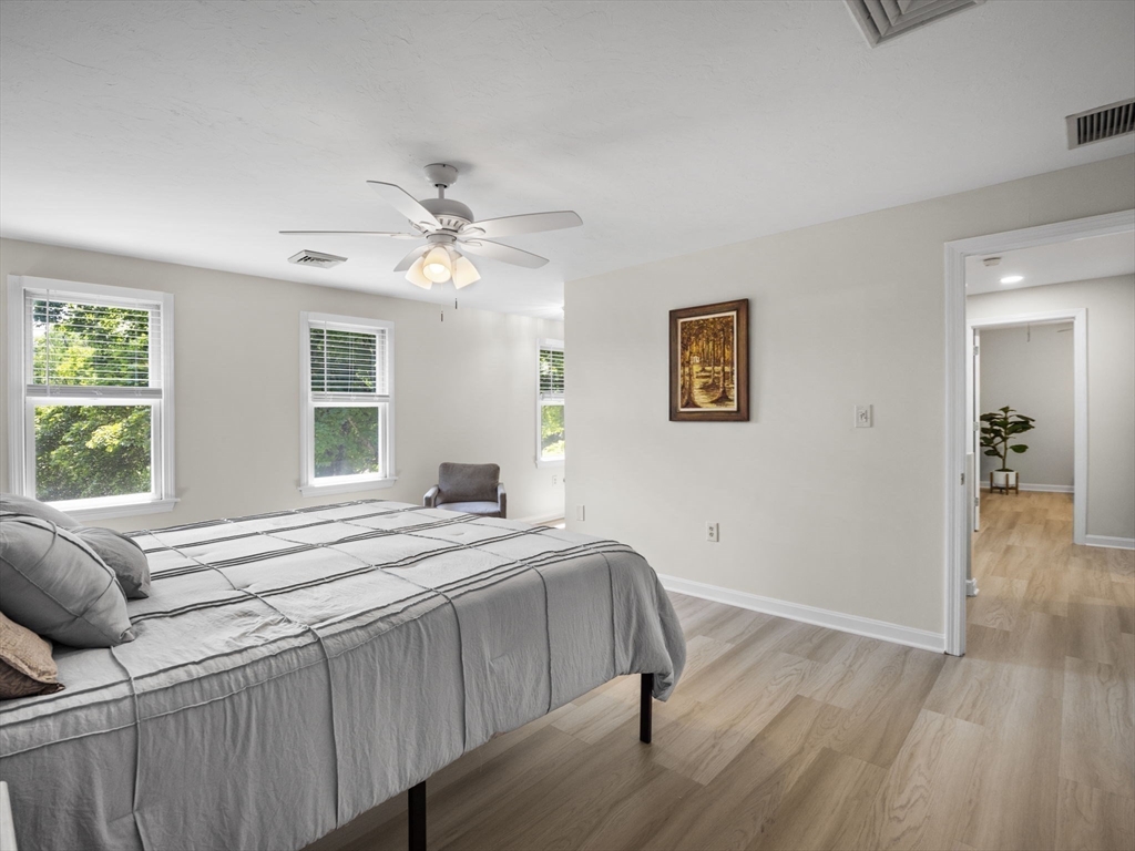 13 Plain Street Upton, MA 01568 - Photo 22 of 42 a bedroom with a bed and a window