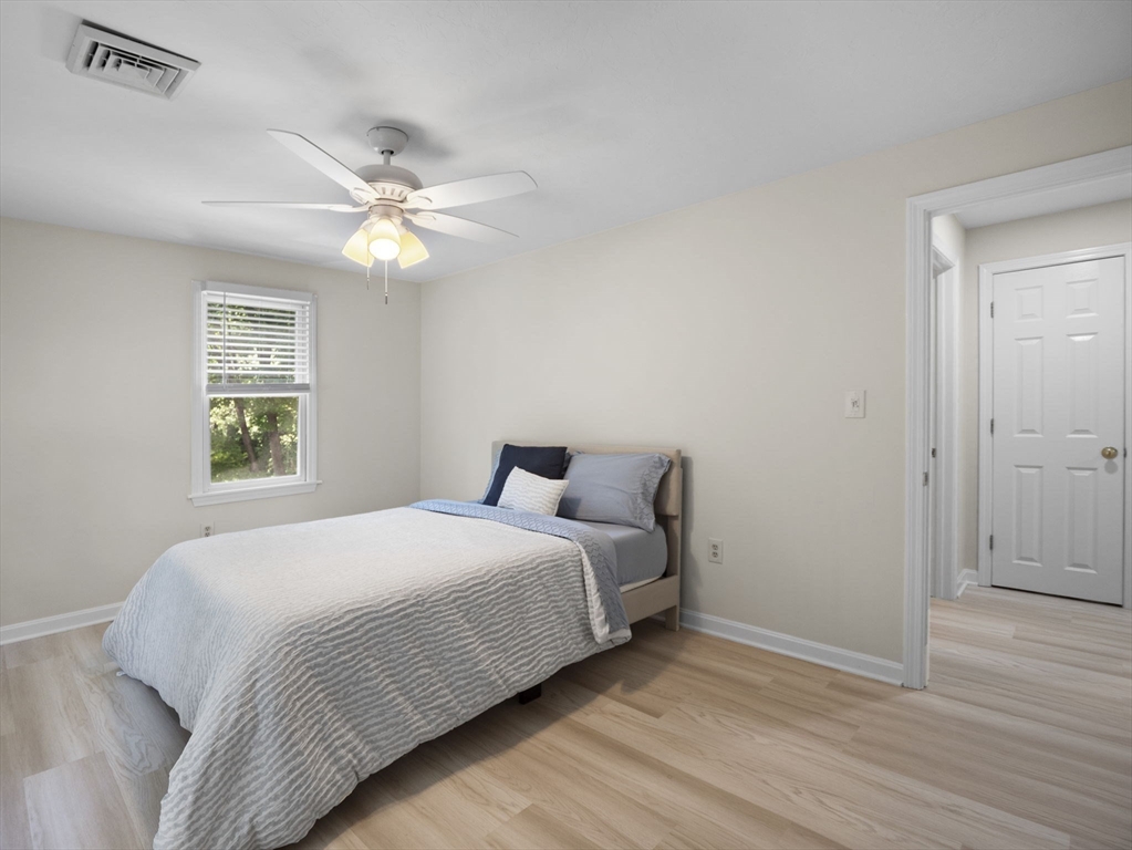 13 Plain Street Upton, MA 01568 - Photo 27 of 42 a bedroom with a bed and a window