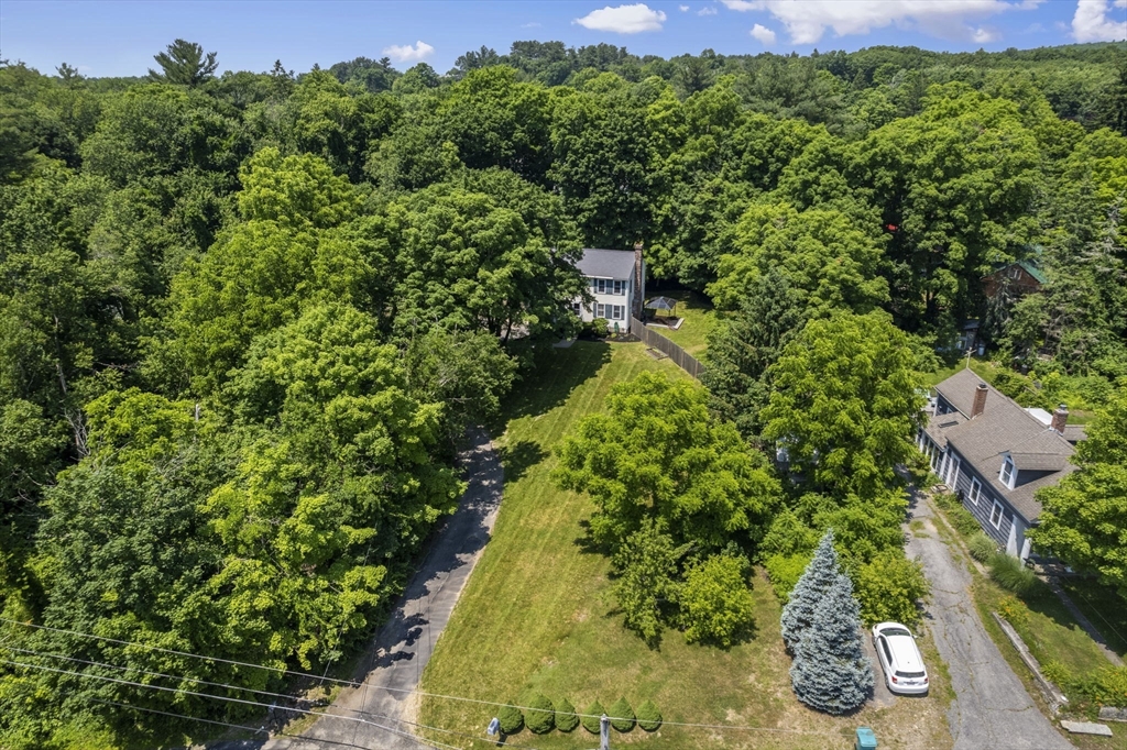 13 Plain Street Upton, MA 01568 - Photo 3 of 42 an aerial view of a house with a yard