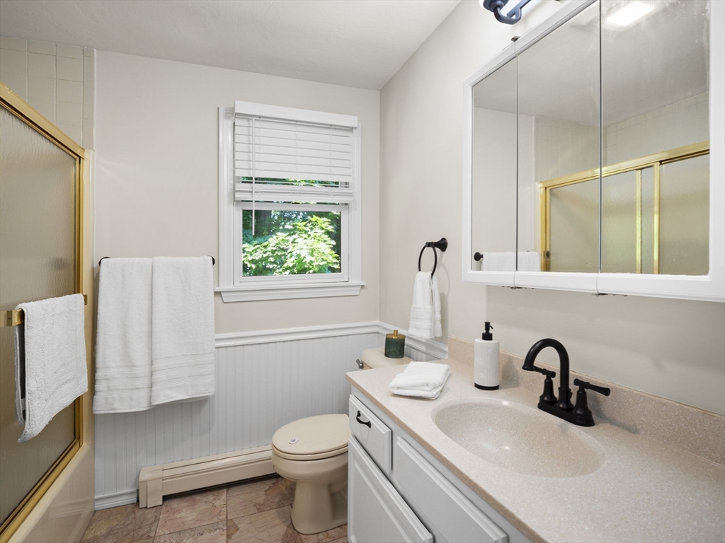 13 Plain Street Upton, MA 01568 - Photo 31 of 42 a bathroom with a sink toilet and a mirror