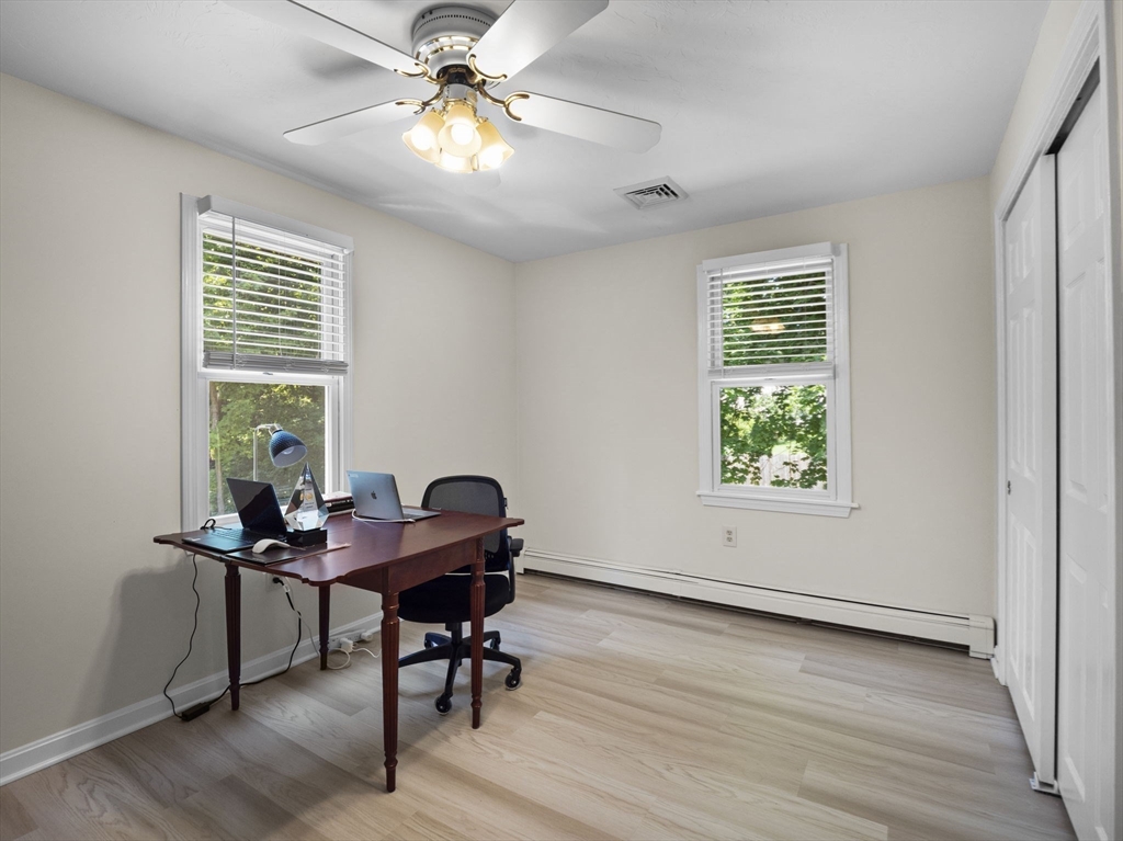 13 Plain Street Upton, MA 01568 - Photo 33 of 42 a view of a workspace with furniture and a window