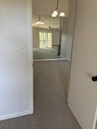 view of hall way with mirror