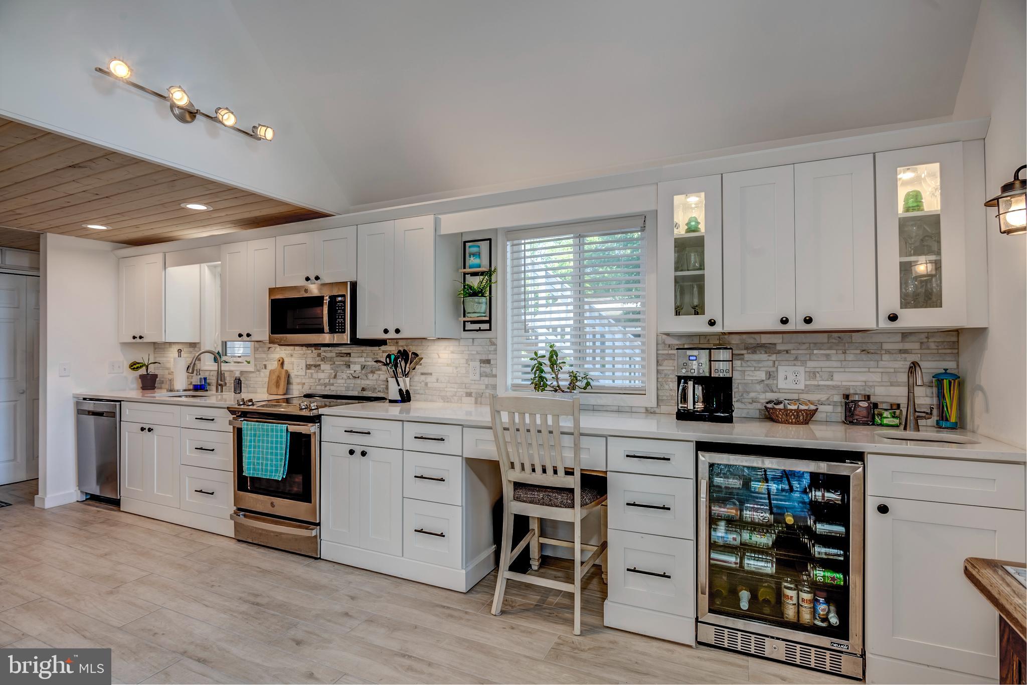 28 Drawbridge Road Ocean Pines, MD 21811 - Photo 4 of 104 Custom cabinets thru out the kitchen w/workspace