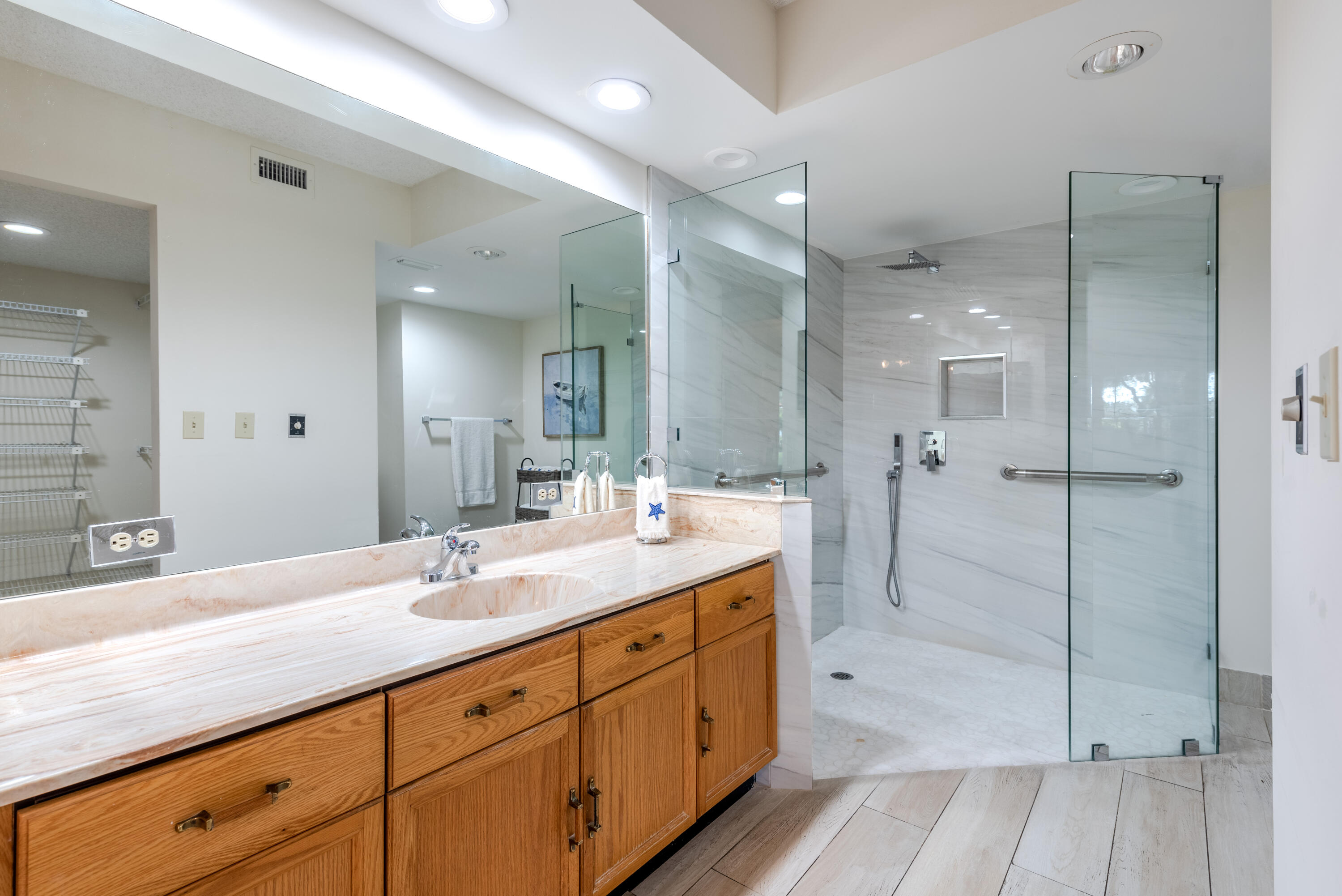 7527 Glendevon Lane, Unit 803 Delray Beach, FL 33446 - Photo 18 of 35 a spacious bathroom with a shower sink double and mirror