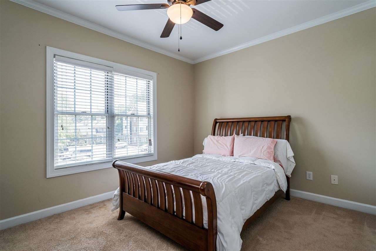7016 Sandy Forks Road, Unit 201 Raleigh, NC 27609 - Photo 21 of 28 Secondary bedroom with plenty of natural light! Bedroom