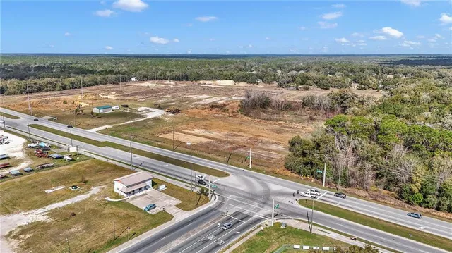 a view of an ocean beach and mountain