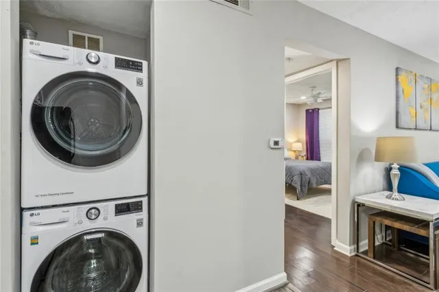 a view of livingroom with washer and dryer