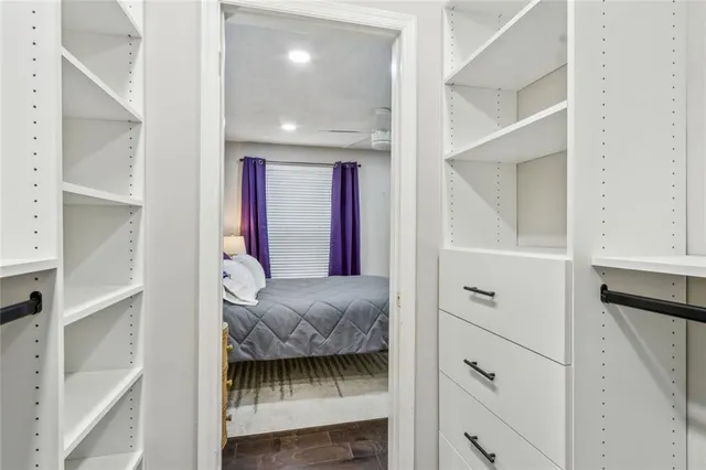 a en suite bathroom with a sink and a mirror