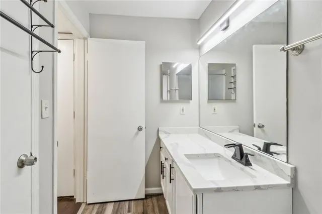 a street view with residential house and green space