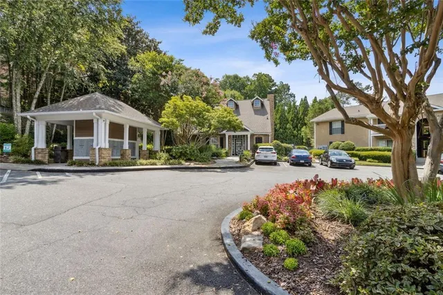 a view of a chairs and table in the patio