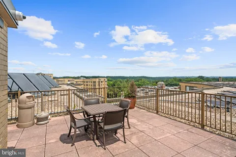 a view of a terrace with furniture