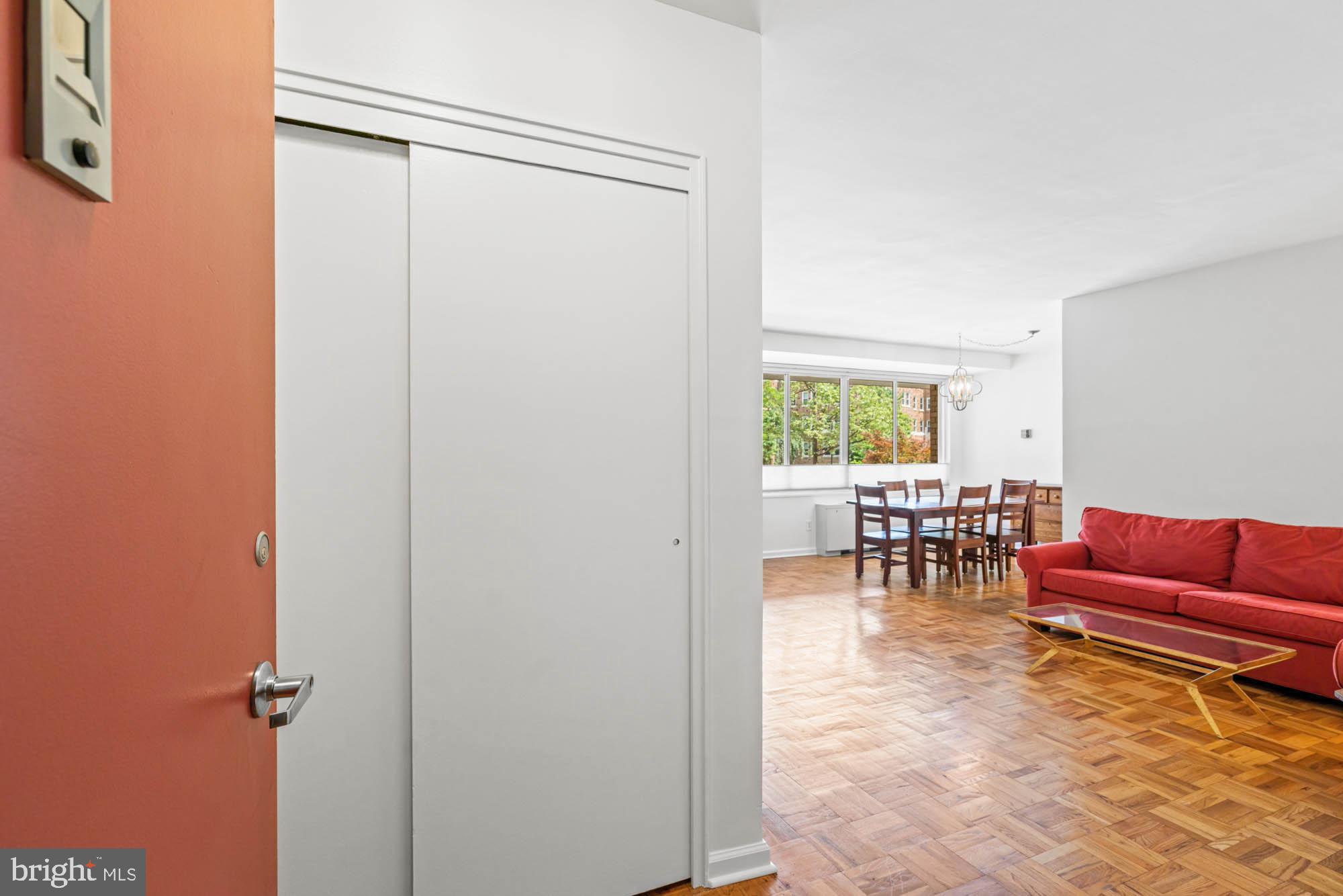 4740 Connecticut Avenue Northwest, Unit 204 Washington, DC 20008 - Photo 5 of 33 a living room with furniture and a window