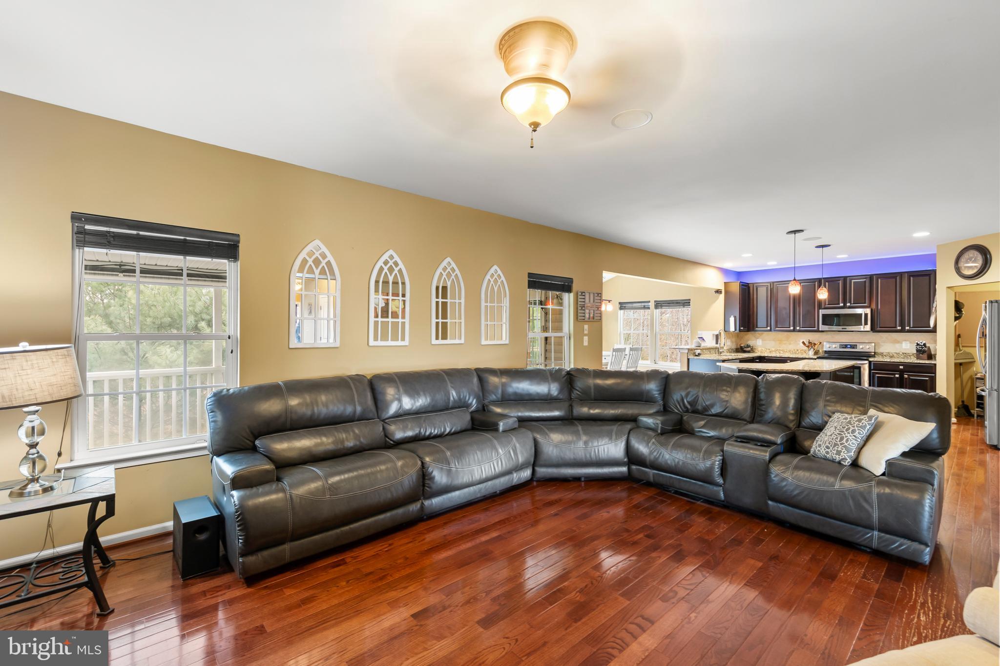 155 Merlot Drive Stephenson, VA 22656 - Photo 15 of 69 a living room with furniture and kitchen view