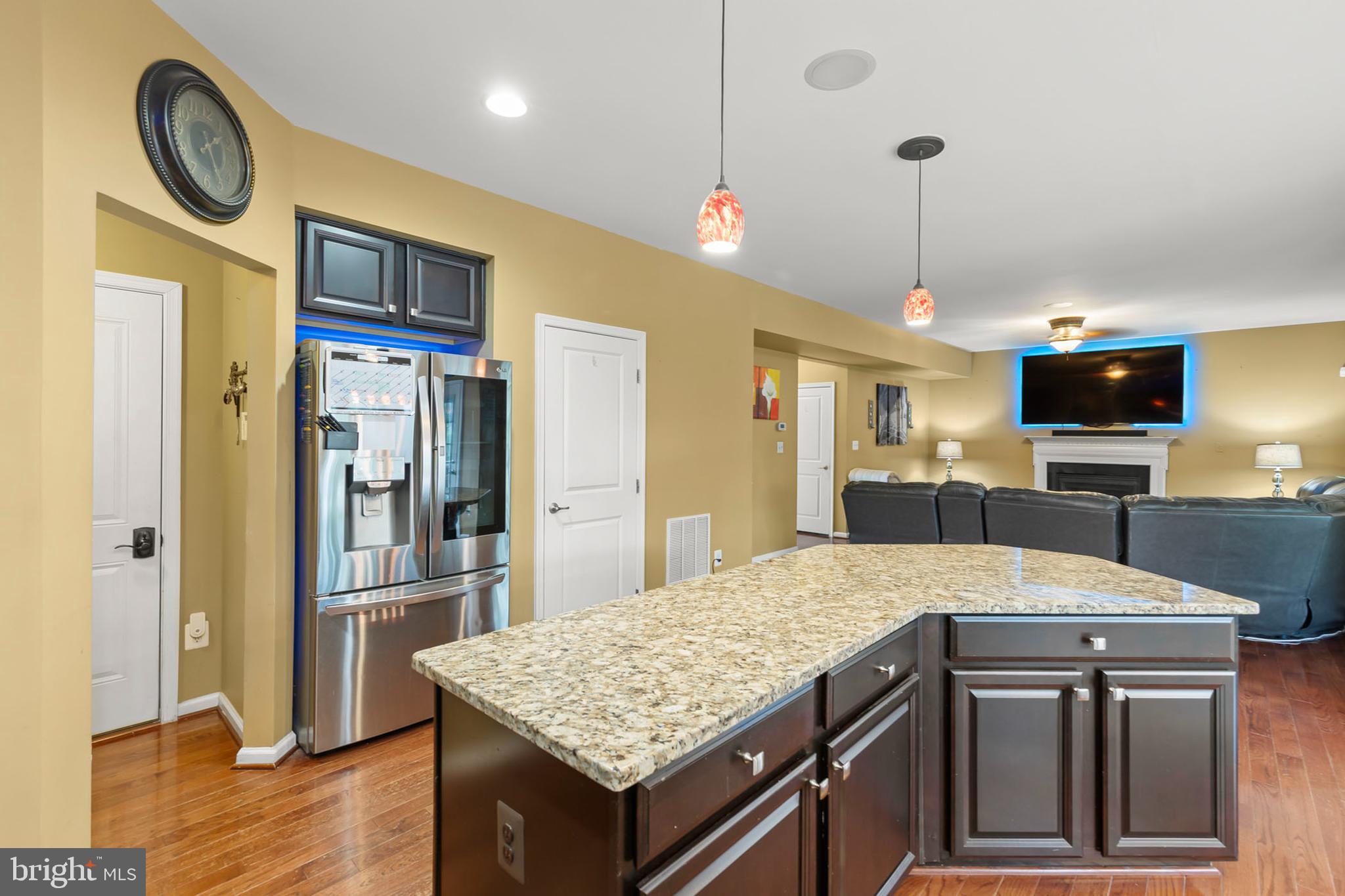 155 Merlot Drive Stephenson, VA 22656 - Photo 19 of 69 a kitchen with stainless steel appliances granite countertop a kitchen island a stove and a sink