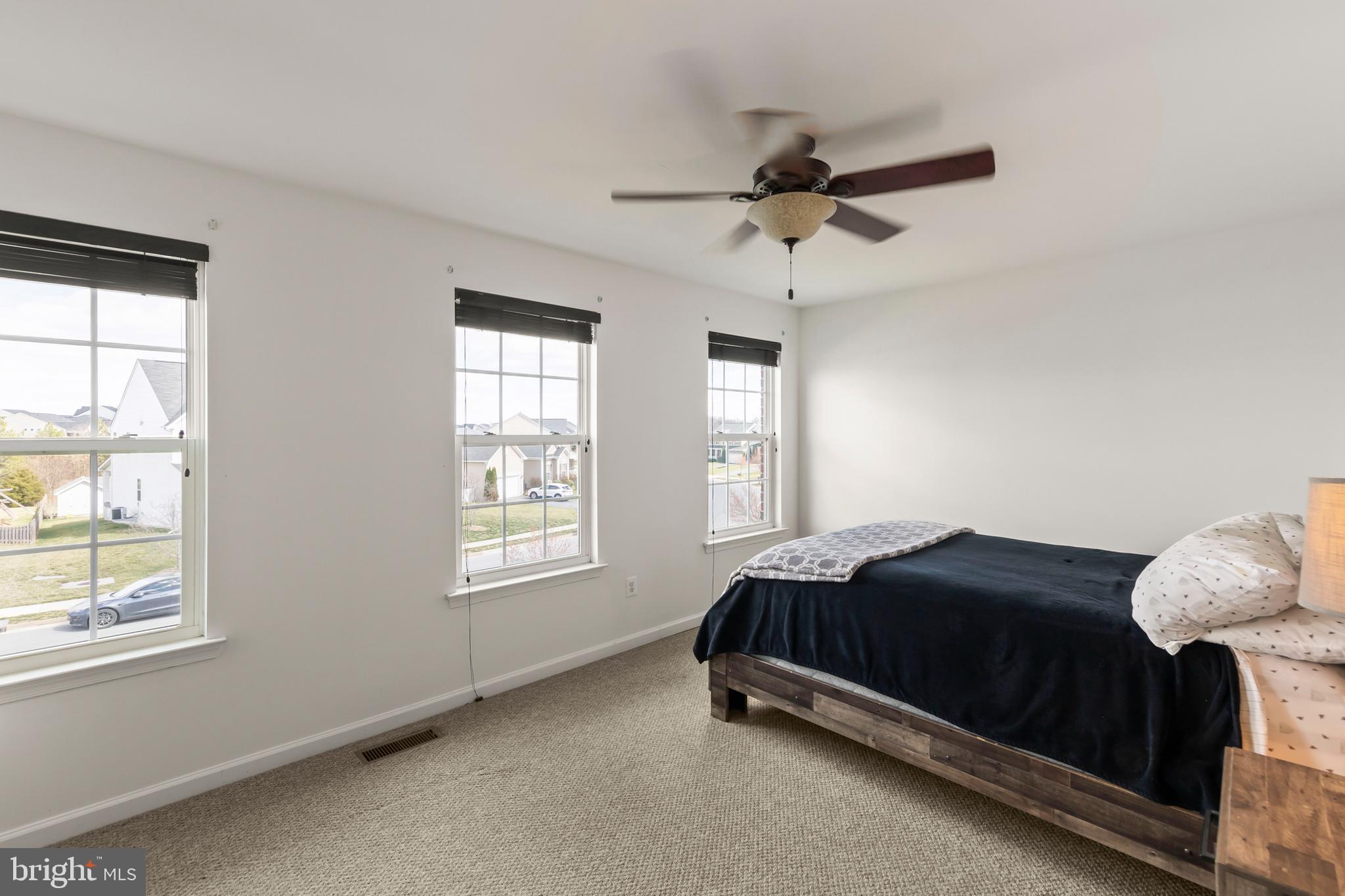 155 Merlot Drive Stephenson, VA 22656 - Photo 28 of 69 a bedroom with a bed and window
