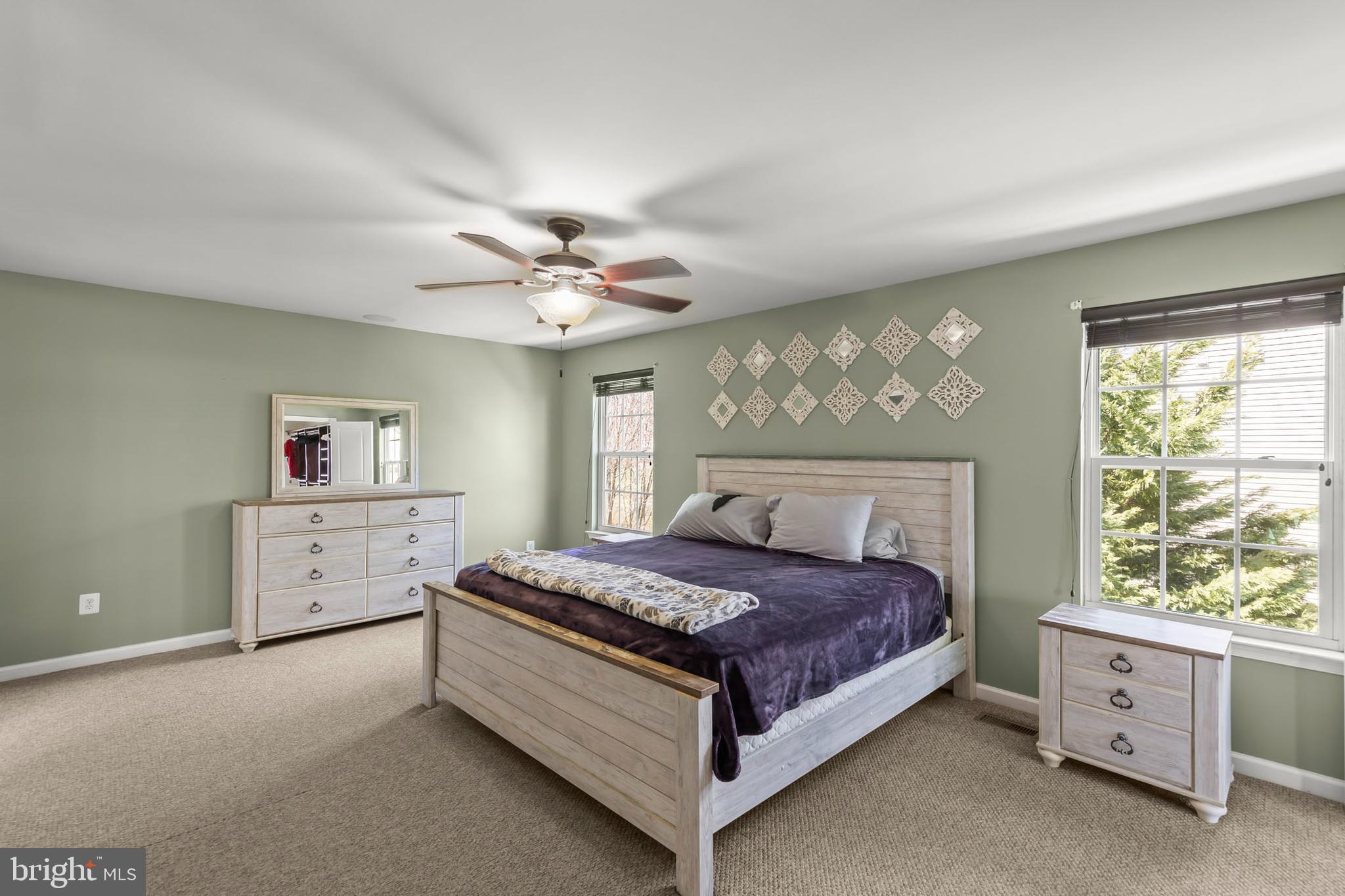 155 Merlot Drive Stephenson, VA 22656 - Photo 31 of 69 a spacious bedroom with a bed and a dresser