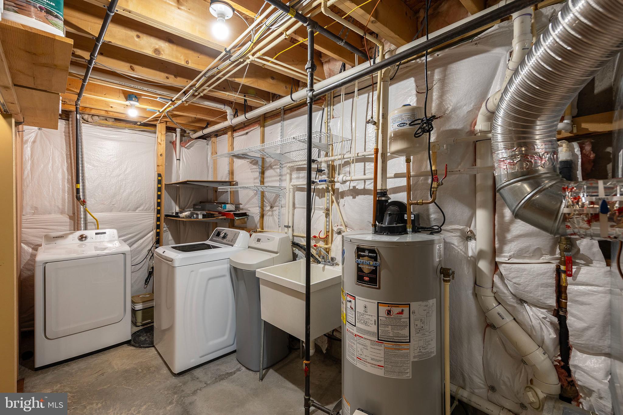 155 Merlot Drive Stephenson, VA 22656 - Photo 43 of 69 a view of storage and utility room with washer and dryer