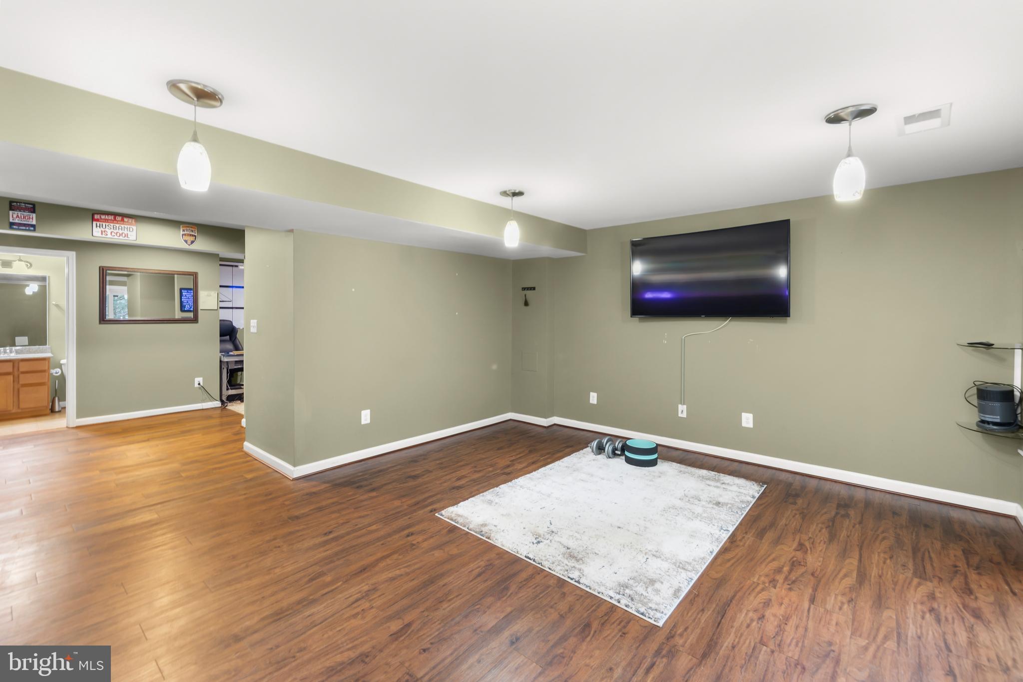 155 Merlot Drive Stephenson, VA 22656 - Photo 47 of 69 a view of empty room with wooden floor